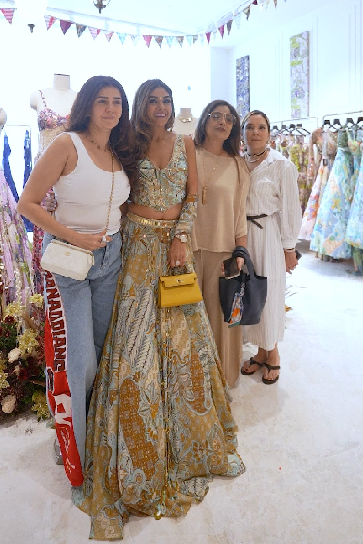 ISHA SAWHNEY IN YELLOW FLORAL CORSET WITH TASSEL LEHENGA & PRINTED DUPATTA SET