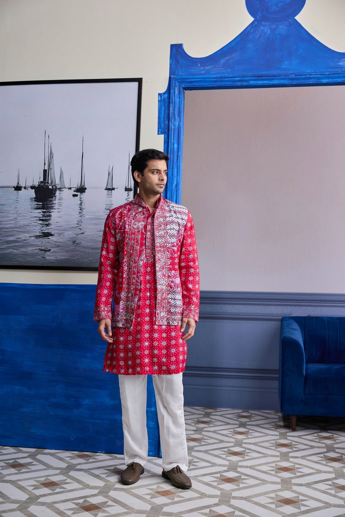 RED PRINT HIGHLIGHTED  KURTA WITH PRINT EMBROIDERED BUNDI AND IVORY PANTS