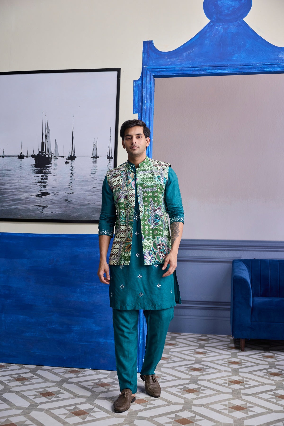 TEAL GREEN EMBROIDERED KURTA WITH PRINT HIGHLIGHTED BUNDI JACKET PAIERD WITH SOLID PANTS