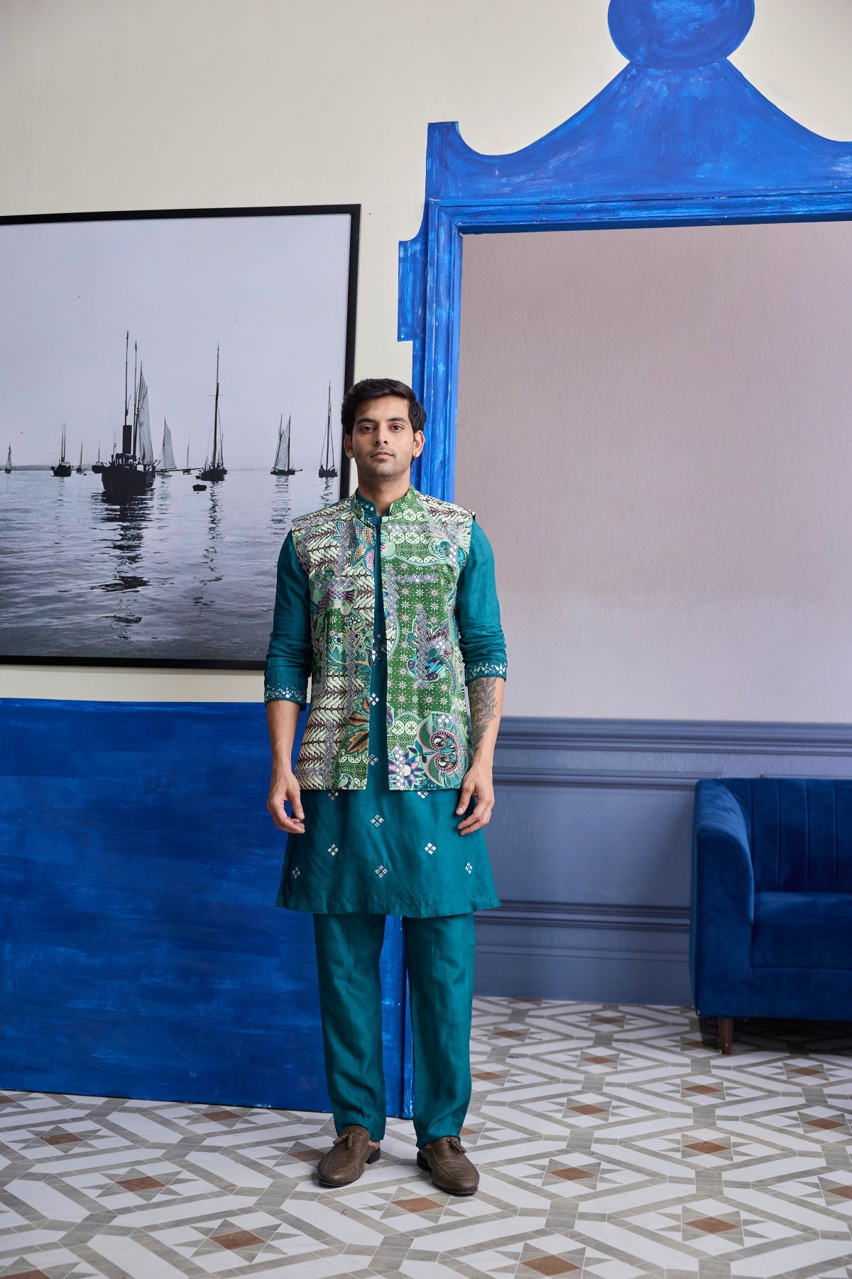 TEAL GREEN EMBROIDERED KURTA WITH PRINT HIGHLIGHTED BUNDI JACKET PAIERD WITH SOLID PANTS