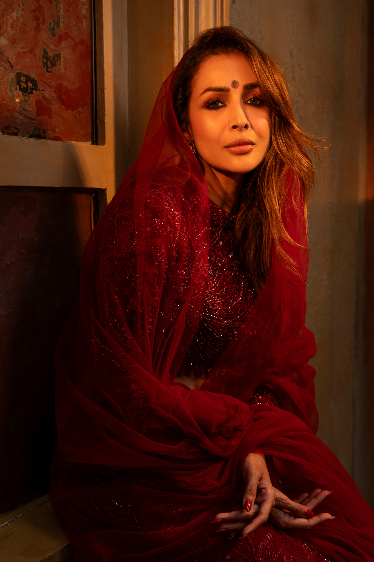 Malika Arora in Maroon Embellished Trail Skirt Set