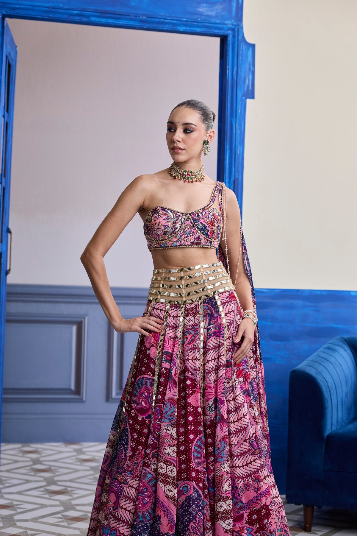 FUCHSIA FLORAL ONE-SHOULDER DRAPE BLOUSE WITH MIRROR LEHENGA SET