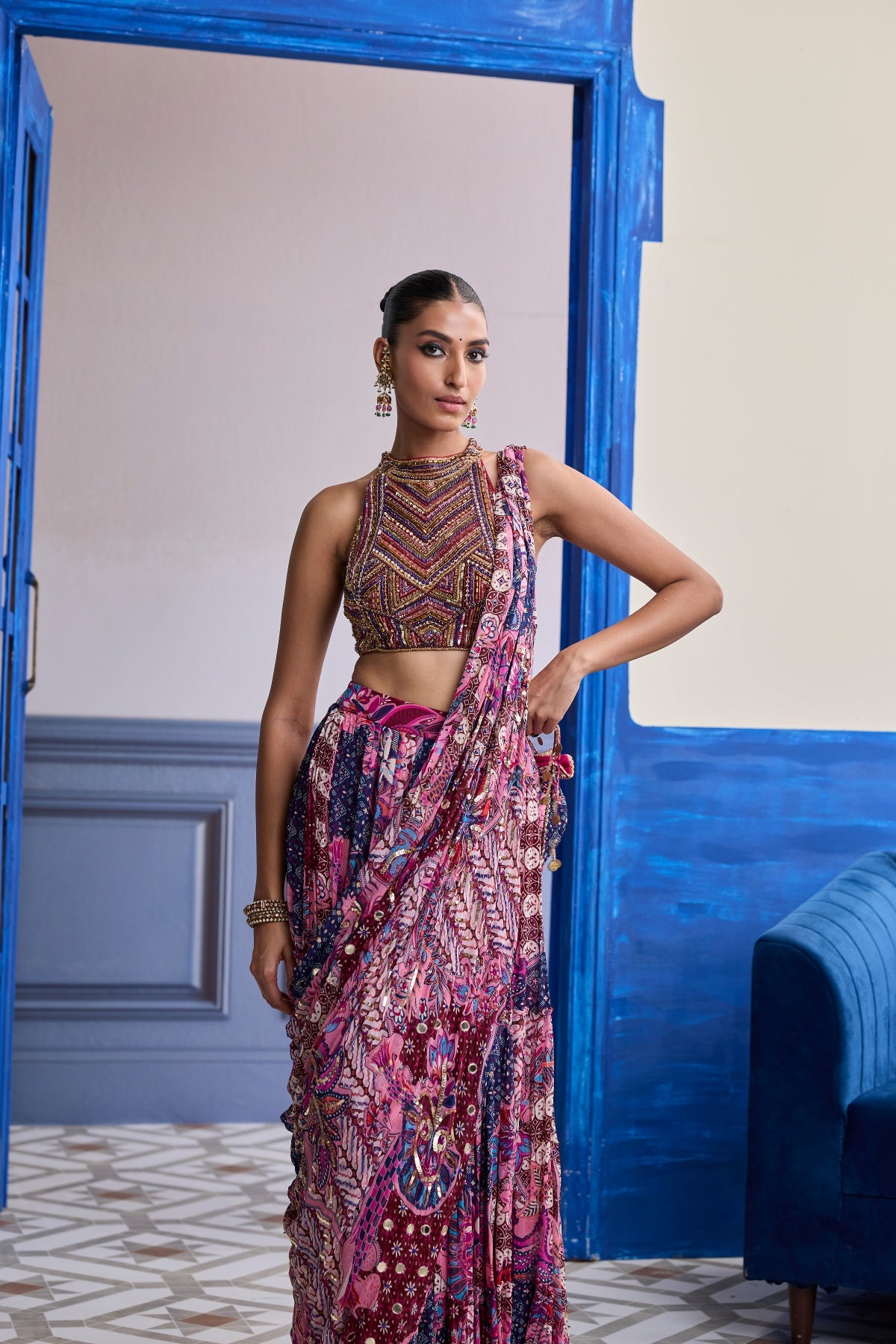 FUCHSIA EMBROIDERED BLOUSE WITH FLORAL DRAPE TIERED SAREE SET