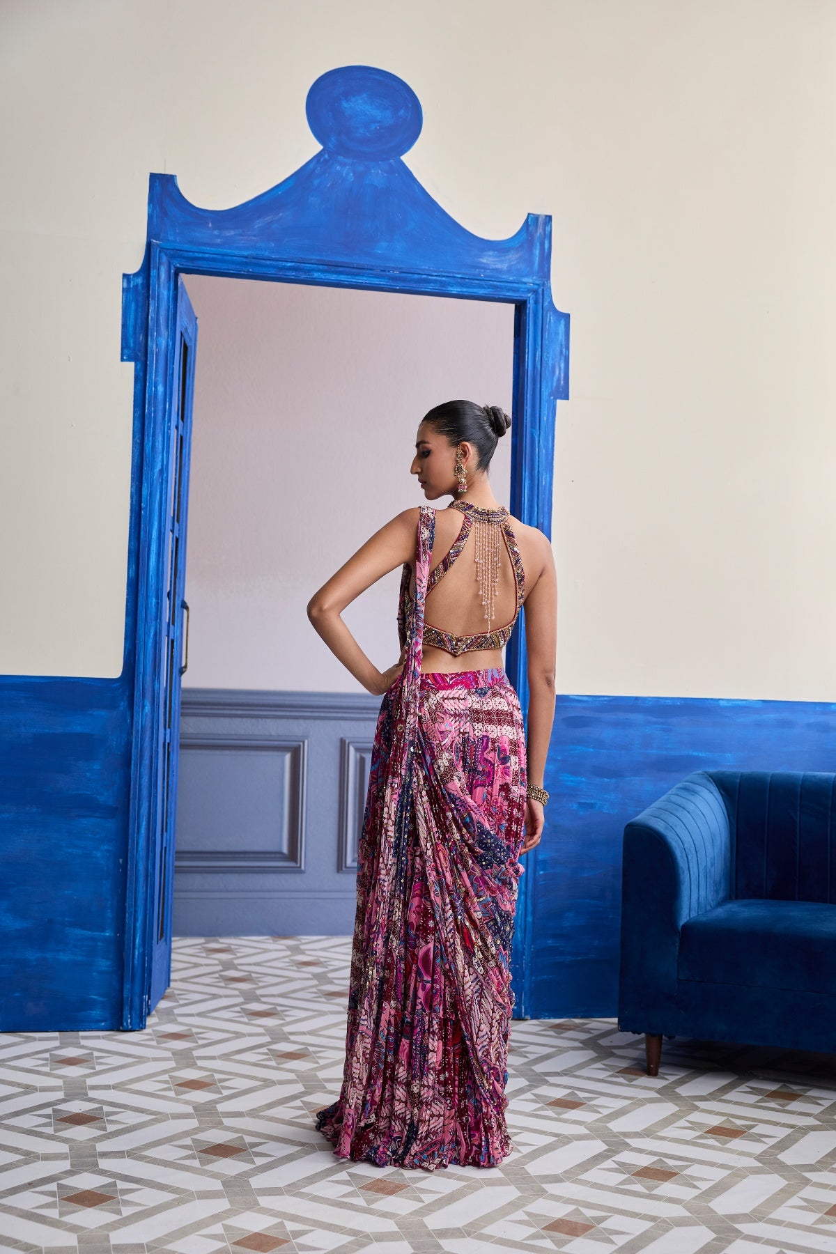 FUCHSIA EMBROIDERED BLOUSE WITH FLORAL DRAPE TIERED SAREE SET