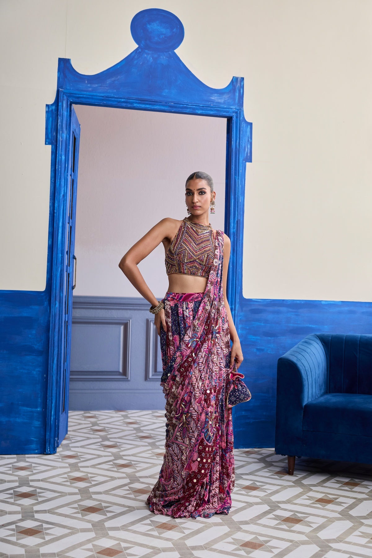 FUCHSIA EMBROIDERED BLOUSE WITH FLORAL DRAPE TIERED SAREE SET