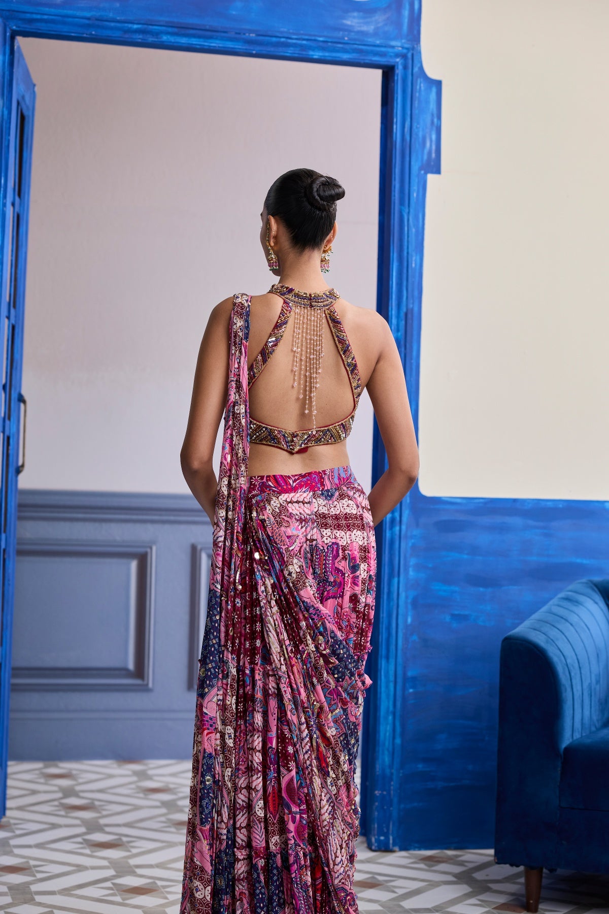 FUCHSIA EMBROIDERED BLOUSE WITH FLORAL DRAPE TIERED SAREE SET