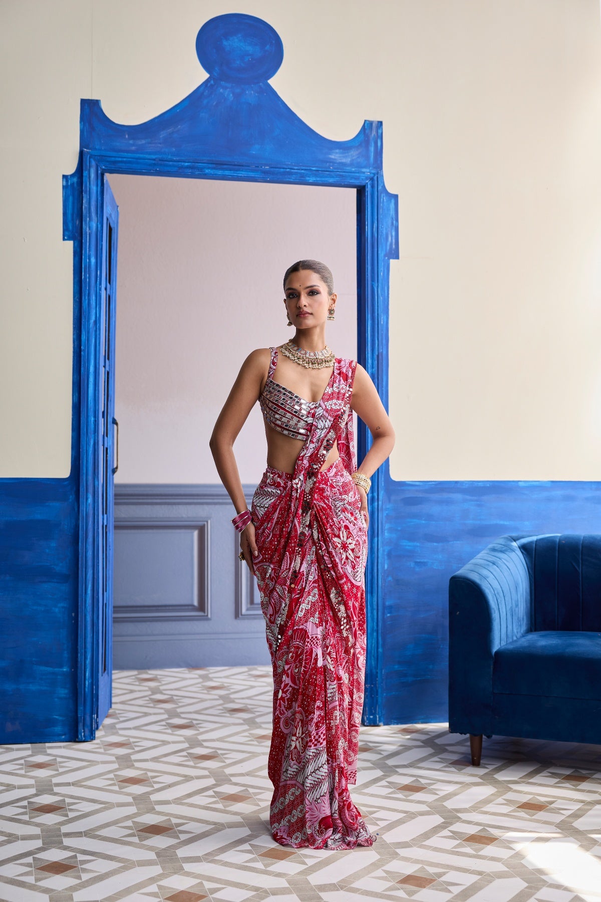 RED MIRROR WORK BLOUSE WITH PRINTED DHOTI SAREE SET