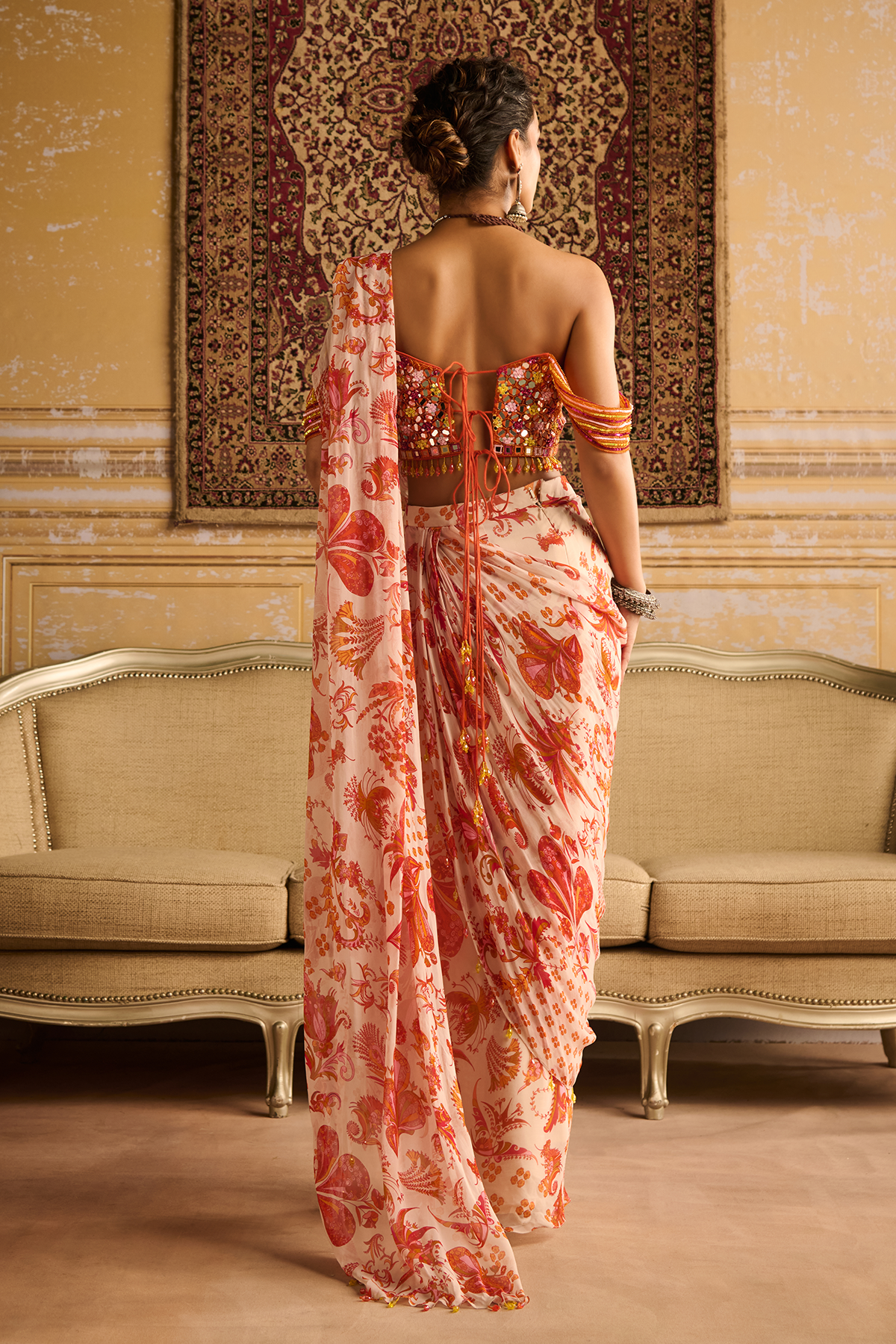 Mirror embroidered blouse and orange skirt saree set