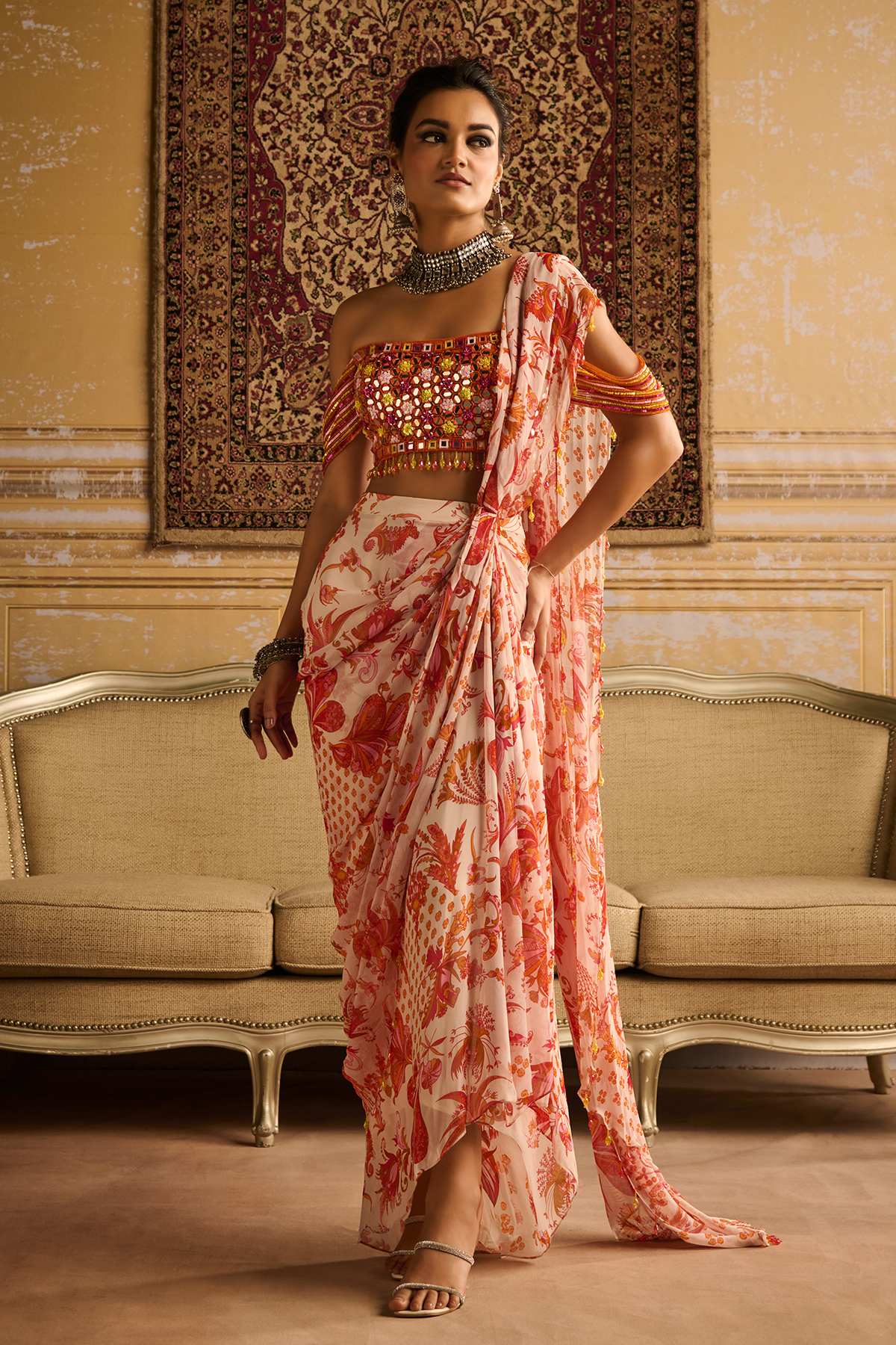 Mirror embroidered blouse and orange skirt saree set