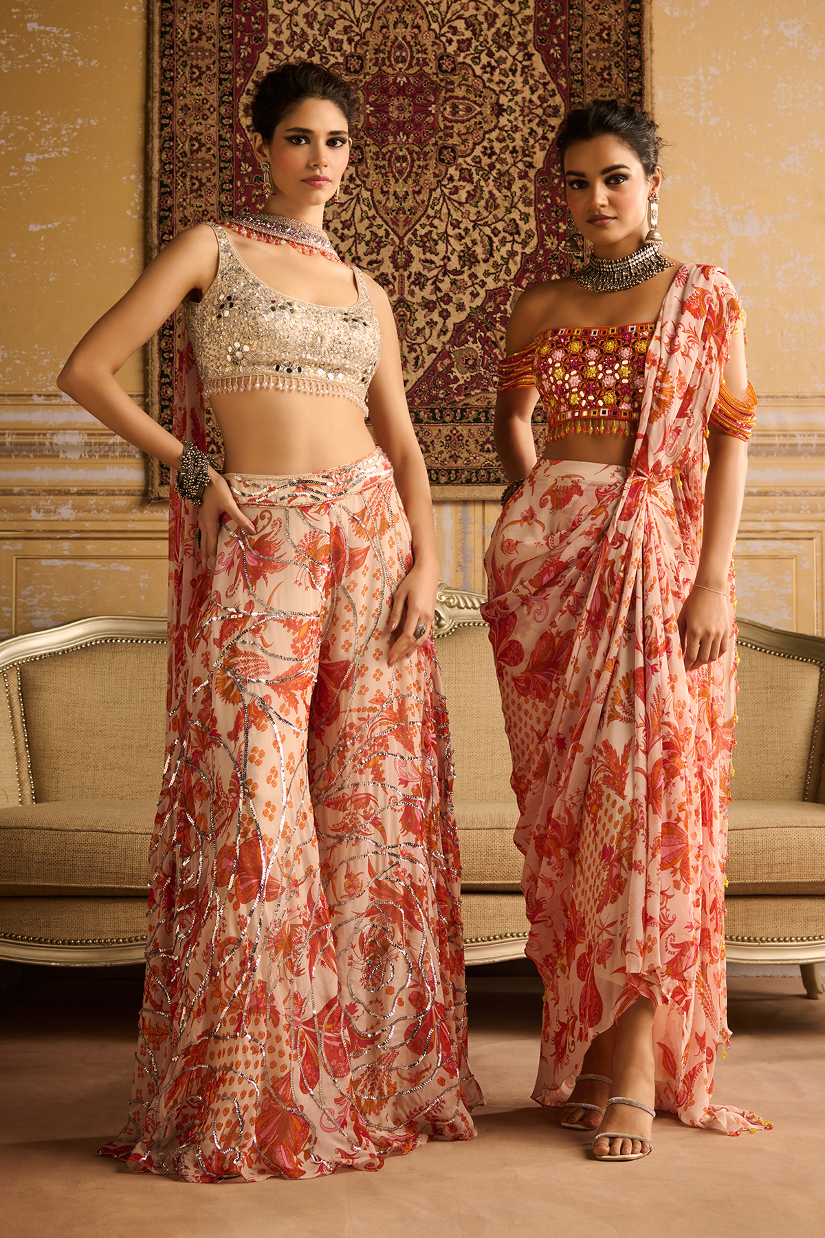 Silver embroidered blouse and Orange cosmic floral jaal Sharara set