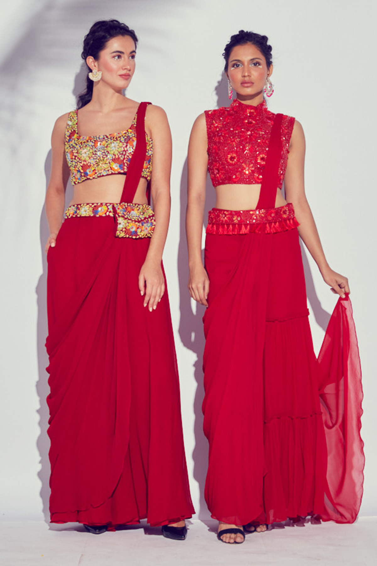 RED PRESTITCHED TIERED PANTS SAREE WITH SELF ON SELF 3D EMBROIDERED HIGH NECK BLOUSE & EMBROIDERED TASSEL BELT