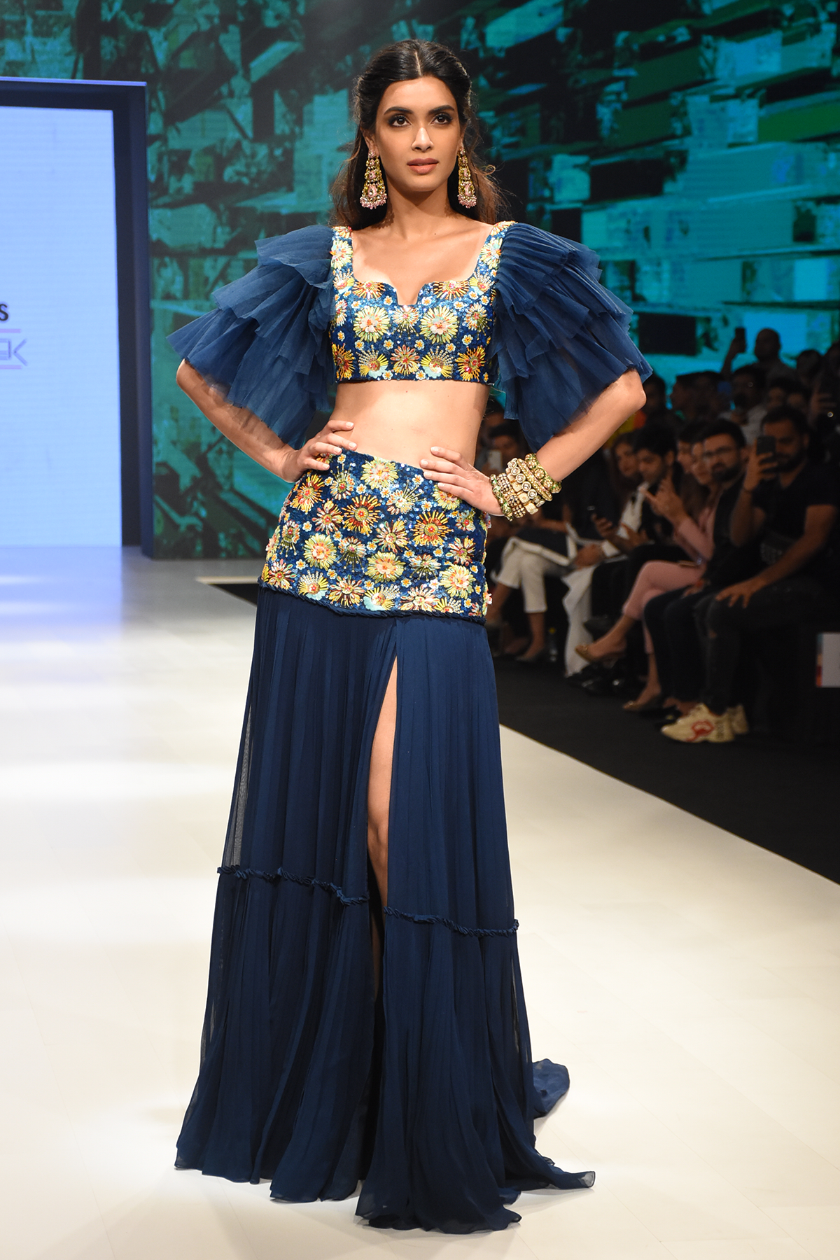 Navy Blue Pleated Tulle sleeved 3D Embroidered Blouse & Embroidered Bask Lehenga