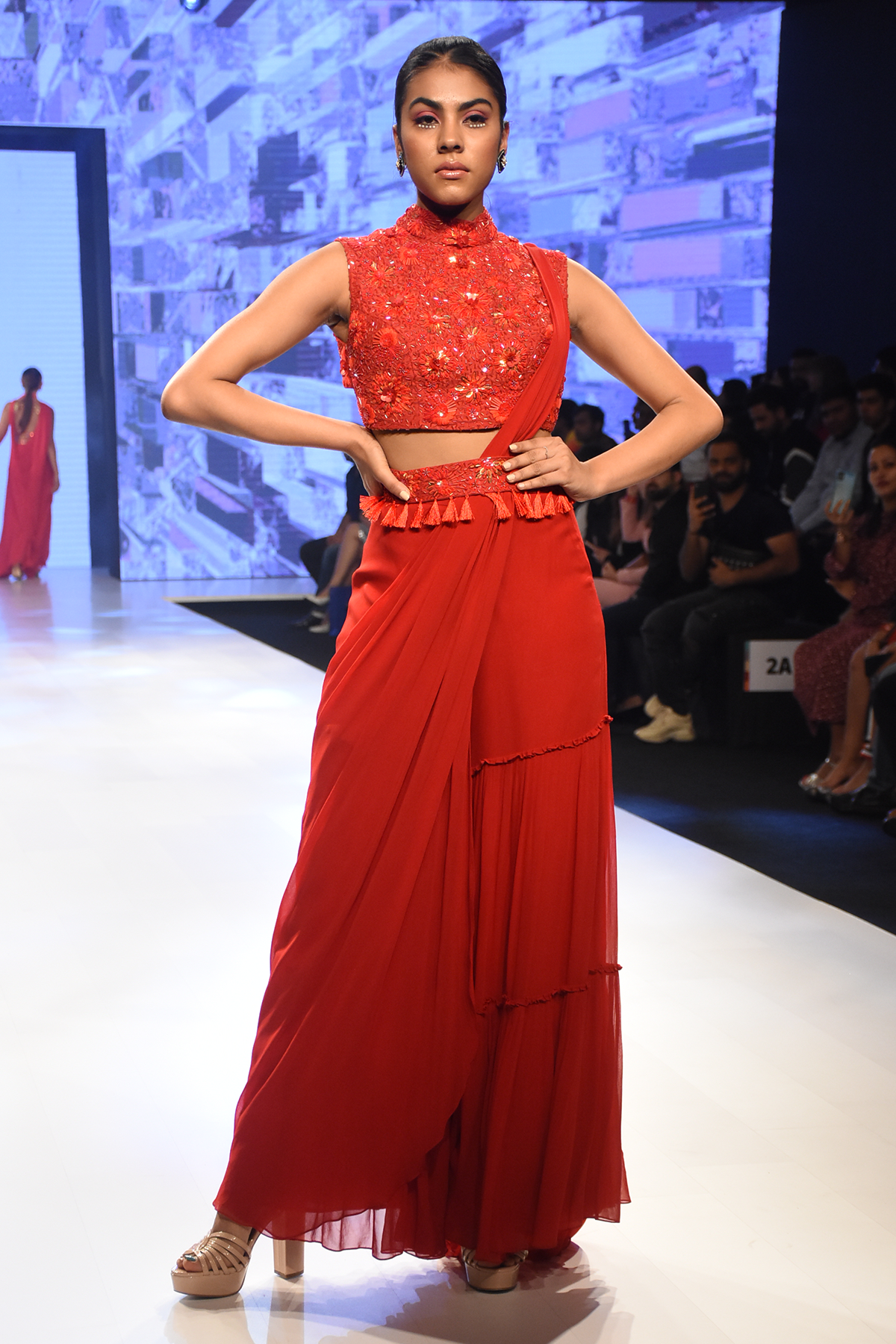 Red Prestitched Tiered Saree With Self on Self 3D Embroidered High Neck Blouse & Embroidered Tassel Belt