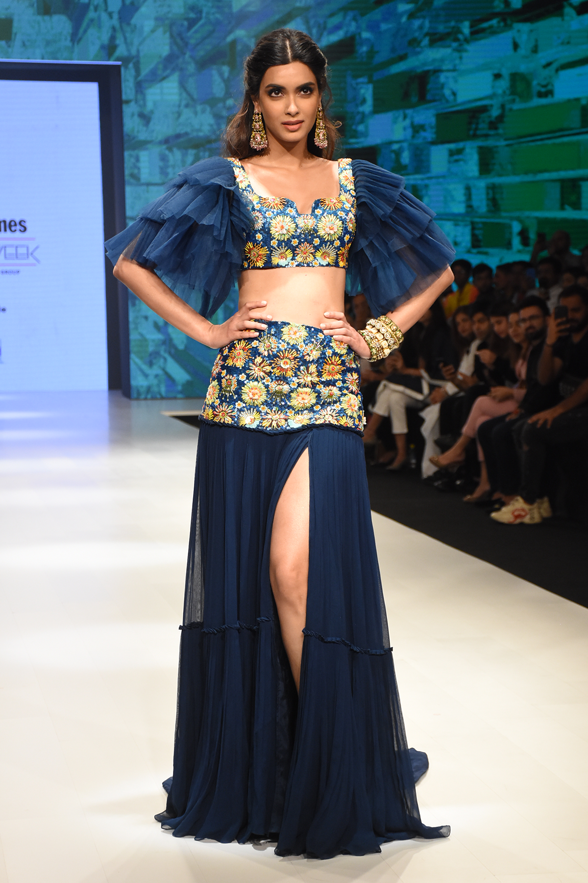 Navy Blue Pleated Tulle sleeved 3D Embroidered Blouse & Embroidered Bask Lehenga