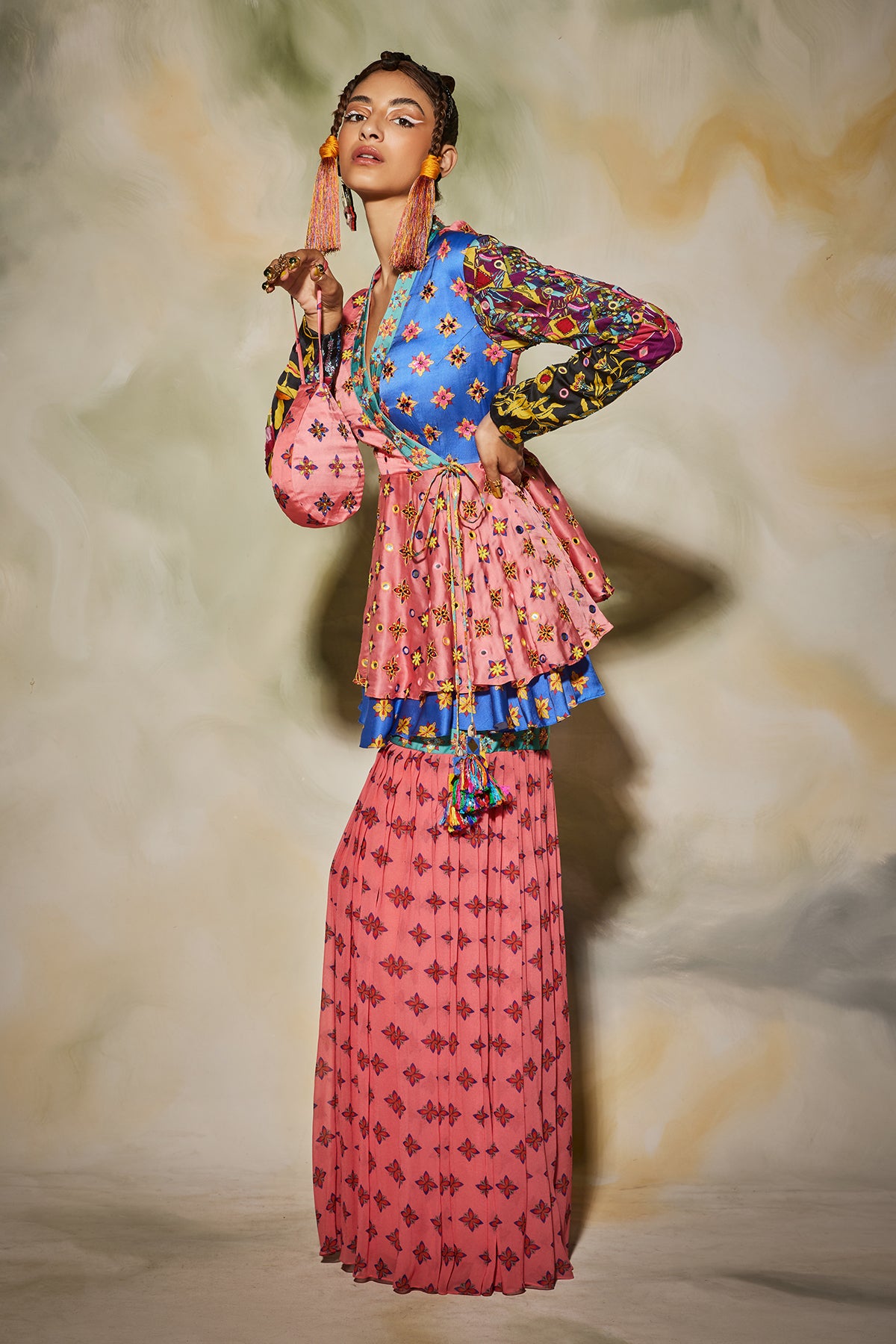 Pink butta gharara pants detailed with embroidered patti with layered peplum top & drop potali bag