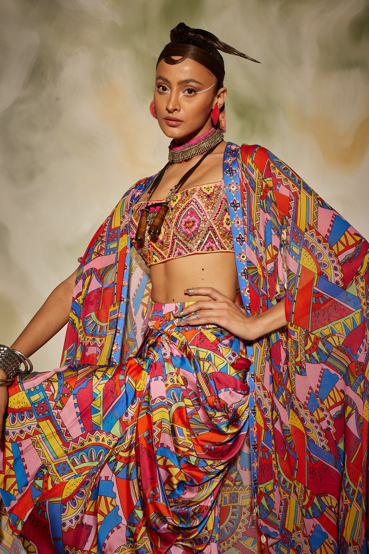 Pink & Blue geometric print front open cape detailed with tassels and dhoti skirt