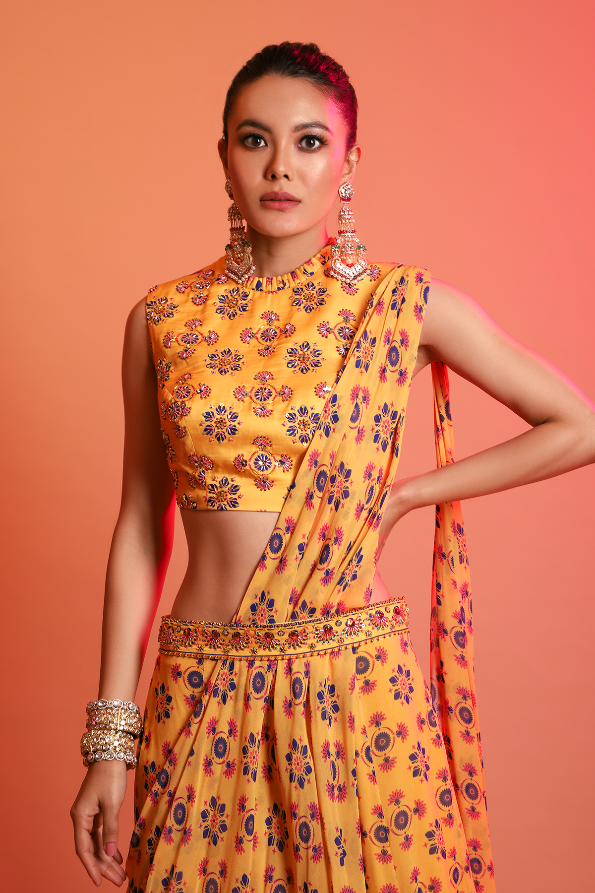 Mustard Mix Butta Highlighted Ruffle Neck Blouse With Printed Mix Butta Sharara Saree & Leather Embroidered Belt