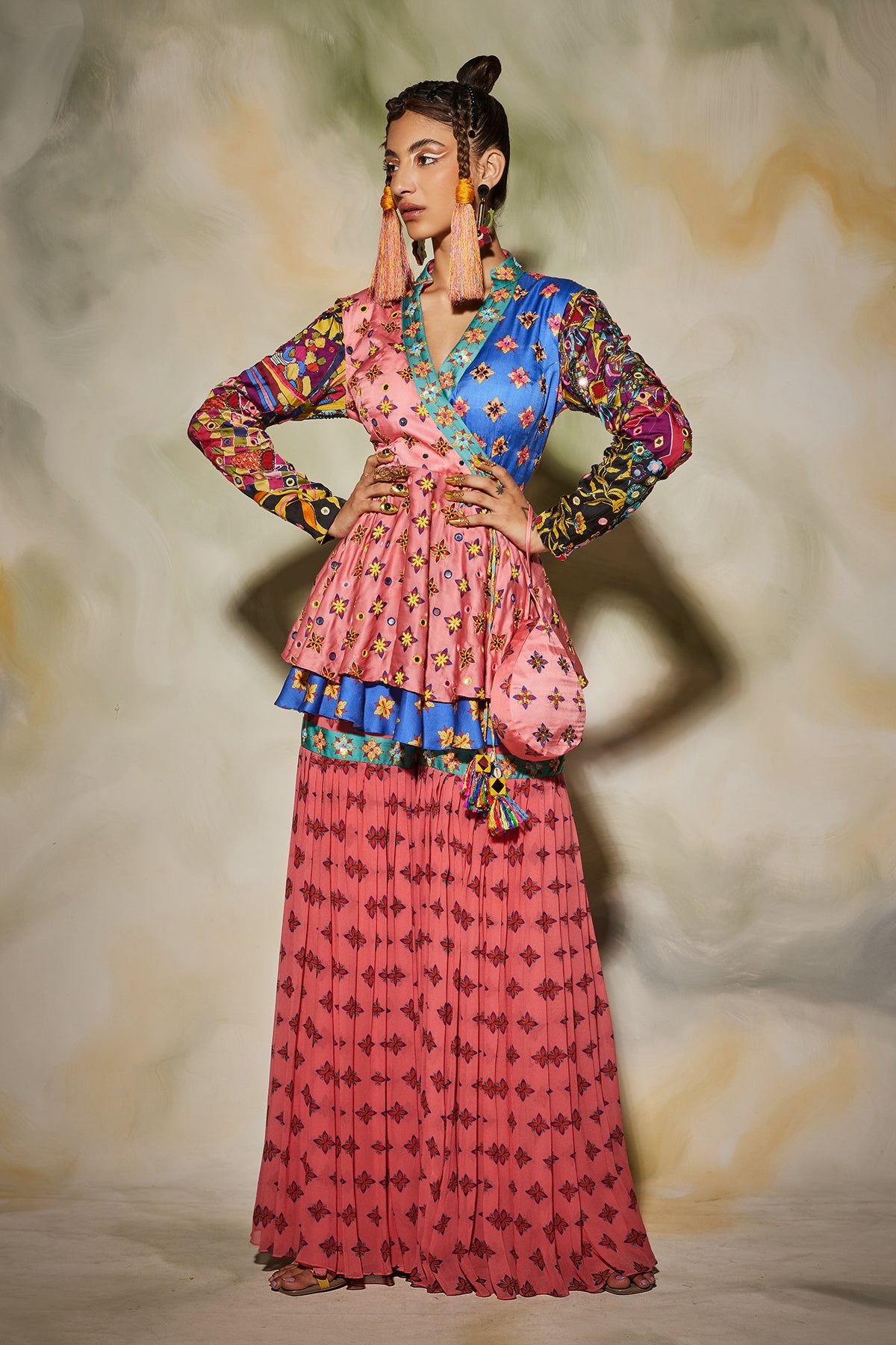 Pink butta gharara pants detailed with embroidered patti with layered peplum top & drop potali bag
